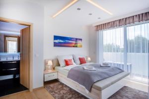 Posteľ alebo postele v izbe v ubytovaní MyFlat Casa Luxury Apartment
