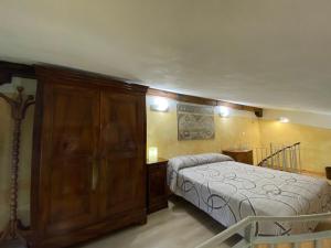 เตียงในห้องที่ Casetta Santa Fortunata Guest House