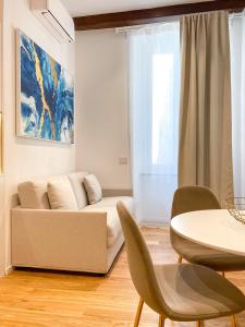 A seating area at La Ripa Camere Vernazza - Stradivari Apartment