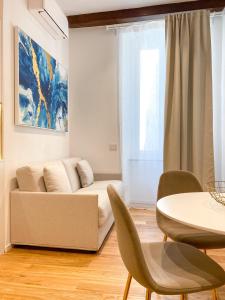 พื้นที่นั่งเล่นของ La Ripa Camere Vernazza - Stradivari Luxury Apartment