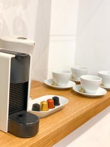 Coffee and tea making facilities at La Ripa Camere Vernazza - Stradivari Apartment Még 15 kép