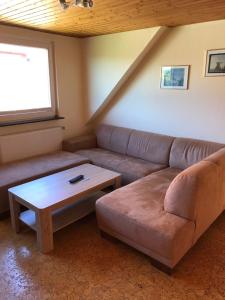 Ein Sitzbereich in der Unterkunft Ferienwohnungen im Gästehaus Sieberns