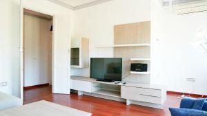 TV a/nebo společenská místnost v ubytování Casa Parque by Ĥ