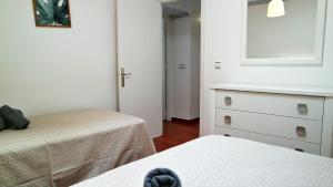 Postel nebo postele na pokoji v ubytování Casa Parque by Ĥ
