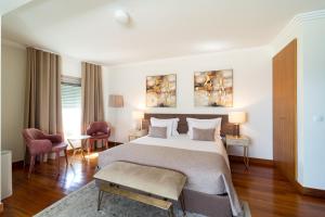 Un pat sau paturi într-o cameră la Oriente 25 Apartments by APT IIN - Parque das Nações