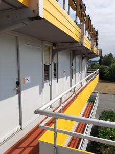 
A balcony or terrace at Premiere Classe Carcassonne
