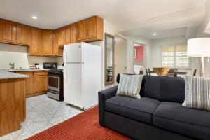 A kitchen or kitchenette at Ramada by Wyndham Oakland Downtown City Center