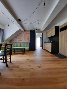 Kuchyň nebo kuchyňský kout v ubytování Apartmány Resort Na Horské