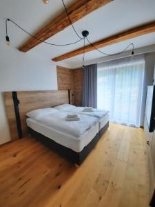 Postel nebo postele na pokoji v ubytování Apartmány Resort Na Horské
