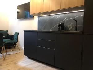 Kuchyňa alebo kuchynka v ubytovaní Villa Julius Sopot