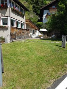 A garden outside La terrazza gardenese