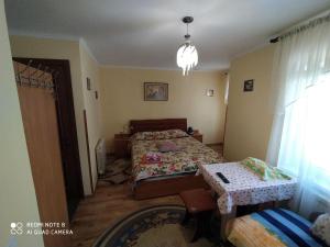 Posteľ alebo postele v izbe v ubytovaní Sadyba Margaryta