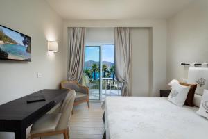 A bed or beds in a room at Hotel Villa Margherita