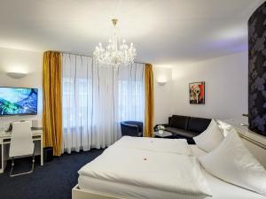 Postel nebo postele na pokoji v ubytování Hotel Linde