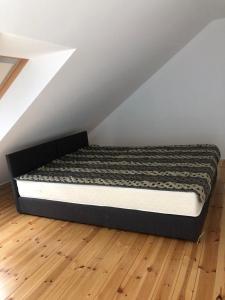 Postel nebo postele na pokoji v ubytování Morskie Wzgórze Apartamenty