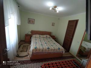 Posteľ alebo postele v izbe v ubytovaní Sadyba Margaryta