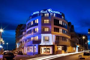 a blue hotel building with a sign on it at Escale Oceania Pornichet La Baule in Pornichet