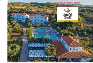 an aerial view of a resort with a swimming pool at Filoxenia Apartments & Studios in Theologos