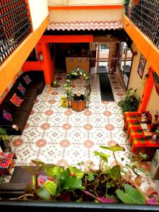 an overhead view of a living room with plants at Hotel Amayal in San Cristóbal de Las Casas