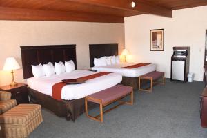 Postel nebo postele na pokoji v ubytování Prairie Inn