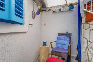 Postel nebo postele na pokoji v ubytování Apartments Kaštel
