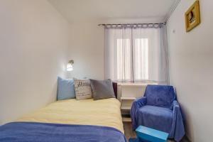 Postel nebo postele na pokoji v ubytování Apartments Kaštel