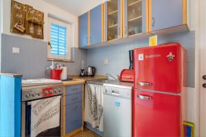 Kuchyň nebo kuchyňský kout v ubytování Apartments Kaštel
