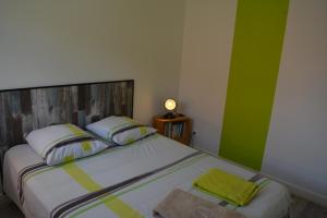 Postel nebo postele na pokoji v ubytování Gîte La Cabotte Rullyotine