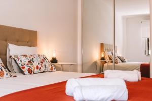 Ένα ή περισσότερα κρεβάτια σε δωμάτιο στο Caparica Sunny House II