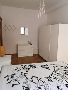 Postel nebo postele na pokoji v ubytování appartamento in villa a Pietragrande Villa Mi Vida