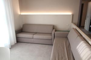 A seating area at Persea mare appartamenti