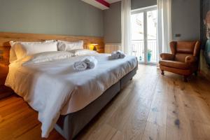 Postel nebo postele na pokoji v ubytování The Lion's Den BnB