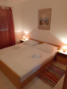 Postel nebo postele na pokoji v ubytování Apartments Verica