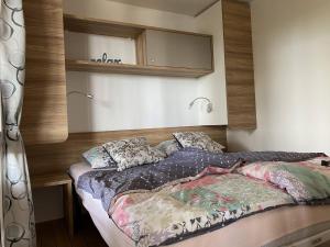 Posteľ alebo postele v izbe v ubytovaní Mobile Home Leggiero 156 - Porton Nature Hideouts