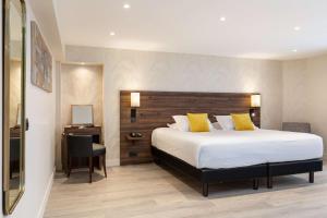 Postel nebo postele na pokoji v ubytování Best Western Plus Hôtel Brice Garden Nice