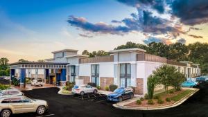 a rendering of a hotel with cars parked in a parking lot at Best Western Plus Yadkin Valley Inn & Suites in Jonesville