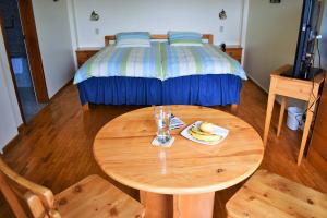 Postel nebo postele na pokoji v ubytování Hotel Rincon Aleman
