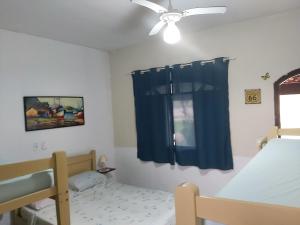 Voodi või voodid majutusasutuse Pousada Jorai e Camping toas