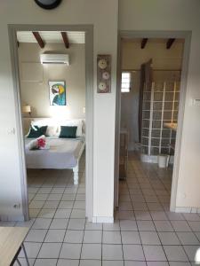 Postel nebo postele na pokoji v ubytování Ti Village Creole