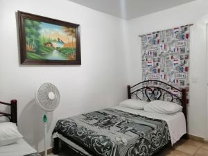 Katil atau katil-katil dalam bilik di Hostal Maple