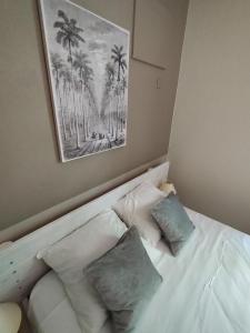 Postel nebo postele na pokoji v ubytování Ti Village Creole