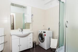 Ванна кімната в Downtown Zadar Apartments