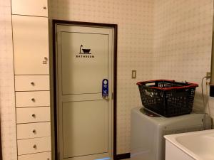 Ein Badezimmer in der Unterkunft BlueberryHouse音威子府村