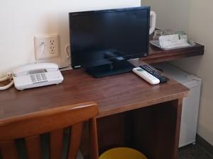 TV a/nebo společenská místnost v ubytování Kumagaya Royal Hotel Suzuki
