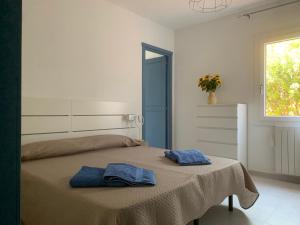 A bed or beds in a room at Bona Ciurrata