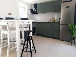 Kuchyň nebo kuchyňský kout v ubytování House Kala N29