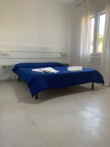 Posteľ alebo postele v izbe v ubytovaní Bona Ciurrata