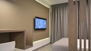 TV a/nebo společenská místnost v ubytování eleven views resort