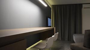 TV a/nebo společenská místnost v ubytování eleven views resort