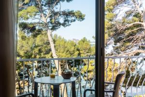 Balkón nebo terasa v ubytování Hôtel Corniche du Liouquet